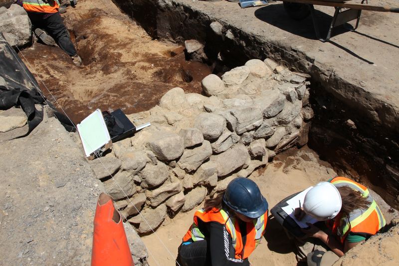A half-excavated foundation wall, made out of field stones in 18th century during an archaeological excavation in Ancienne Lorette near Queb
