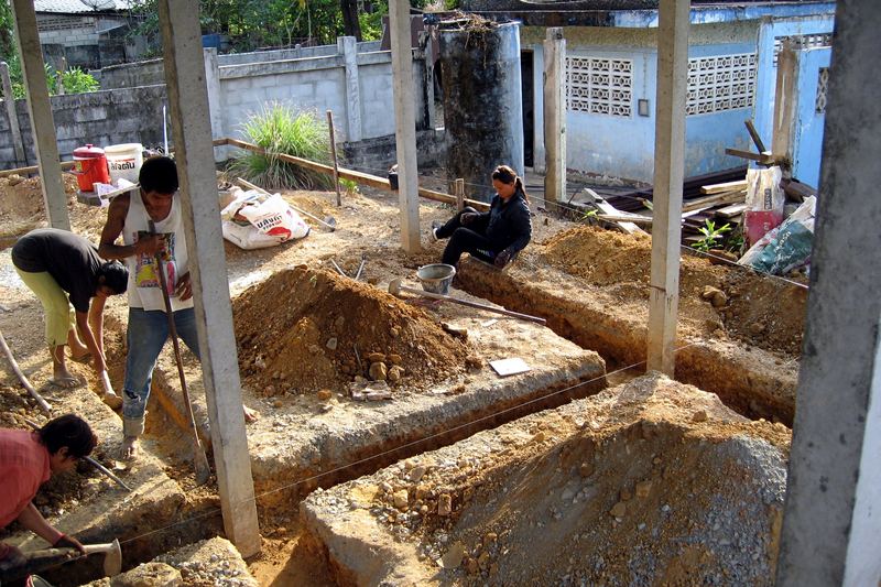 Concrete trenches for wall footings. Residential house building site in Trat, Thailand.